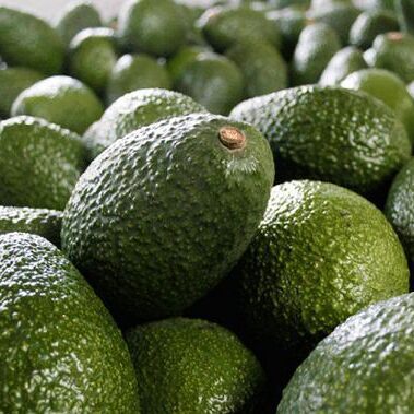 Large number of avocados in a pile
